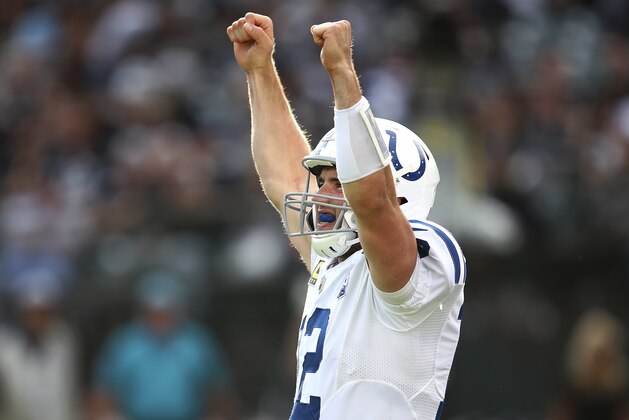 FILE - In this Oct. 28, 2018, file photo, Indianapolis Colts quarterback Andrew Luck celebrates during the second half of the team's NFL football game against the Oakland Raiders in Oakland, Calif. Halfway through his comeback season, the star quarterback looks like his old self and the numbers suggest he’s actually playing better. Luck’s strong return has helped the Colts win back-to-back games for the first time in nearly two years and they head into the bye weekend full of momentum and plenty of hope. (AP Photo/Ben Margot, File)