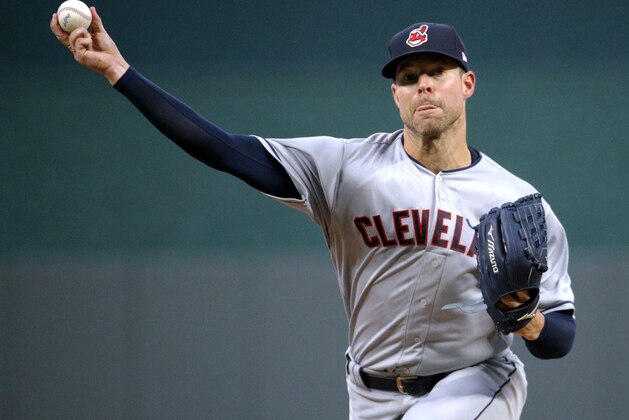 Cleveland Indians starting pitcher Corey Kluber throws during the first inning of a baseball game against the Kansas City Royals on Saturday, Sept. 29, 2018, in Kansas City, Mo. (AP Photo/Charlie Riedel)
