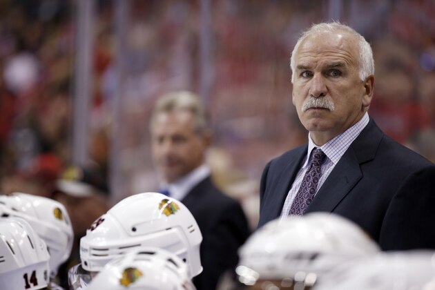 Chicago Blackhawks head coach Joel Quenneville stands in the bench in the third period of an NHL hockey game against the Washington Capitals, Thursday, Oct. 15, 2015, in Washington. The Capitals won 4-1. (AP Photo/Alex Brandon)