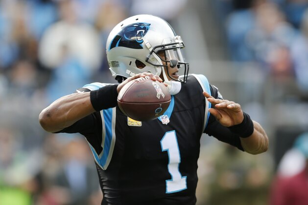 Carolina Panthers' Cam Newton (1) looks to pass against the Tampa Bay Buccaneers in the first half of an NFL football game in Charlotte, N.C., Sunday, Nov. 4, 2018. (AP Photo/Nell Redmond)