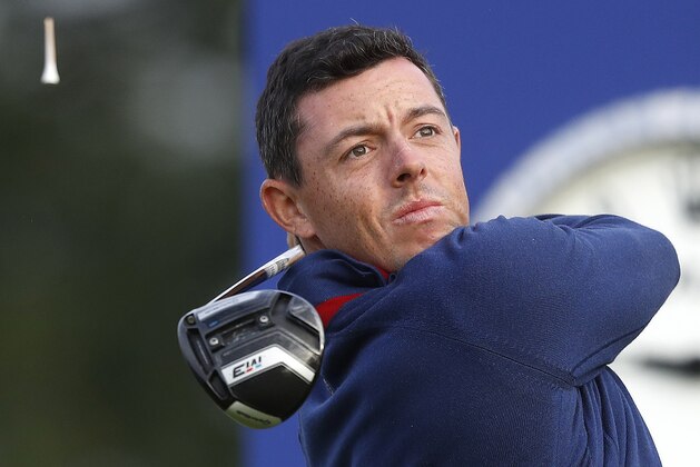 Europe's Rory McIlroy plays from the 4th tee during a fourball match on the opening day of the 42nd Ryder Cup at Le Golf National in Saint-Quentin-en-Yvelines, outside Paris, France, Friday, Sept. 28, 2018. (AP Photo/Alastair Grant)