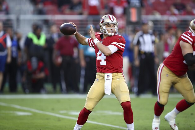 San Francisco 49ers quarterback Nick Mullens (4) passes against the Oakland Raiders during the first half of an NFL football game in Santa Clara, Calif., Thursday, Nov. 1, 2018. (AP Photo/Ben Margot)