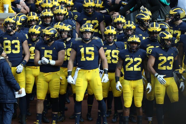 ANN ARBOR, MI - NOVEMBER 03: Chase Winovich #15 of the Michigan Wolverines gets ready to lead the team onto the field prior to the start of the game against the Penn State Nittany Lions at Michigan Stadium on November 3, 2018 in Ann Arbor, Michigan. Michigan defeated Penn State 42-7. (Photo by Leon Halip/Getty Images)