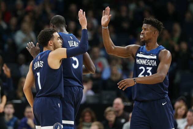 MINNEAPOLIS, MN - DECEMBER 3:  Tyus Jones #1 of the Minnesota Timberwolves and Jimmy Butler #23 of the Minnesota Timberwolves high five during the game against the LA Clippers on December 3, 2017 at Target Center in Minneapolis, Minnesota. NOTE TO USER: User expressly acknowledges and agrees that, by downloading and or using this Photograph, user is consenting to the terms and conditions of the Getty Images License Agreement. Mandatory Copyright Notice: Copyright 2017 NBAE (Photo by Jordan Johnson/NBAE via Getty Images)