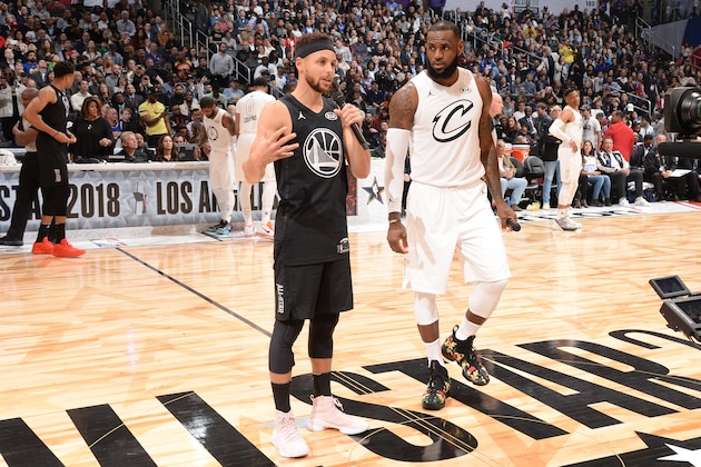LOS ANGELES, CA - FEBRUARY 18: Stephen Curry #30 and LeBron James #23 speak to the crowd during the NBA All-Star Game as a part of 2018 NBA All-Star Weekend at STAPLES Center on February 18, 2018 in Los Angeles, California. NOTE TO USER: User expressly acknowledges and agrees that, by downloading and/or using this photograph, user is consenting to the terms and conditions of the Getty Images License Agreement.  Mandatory Copyright Notice: Copyright 2018 NBAE (Photo by Andrew D. Bernstein/NBAE via Getty Images)