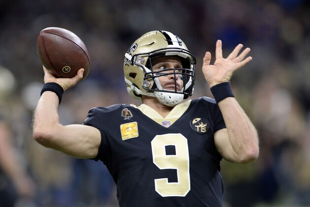New Orleans Saints quarterback Drew Brees (9) warms up before an NFL football game against the Los Angeles Rams in New Orleans, Sunday, Nov. 4, 2018. (AP Photo/Bill Feig)