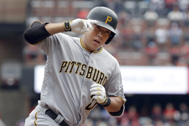 FILE - In this Oct. 1, 2016 file photo, Pittsburgh Pirates' Jung Ho Kang rounds the bases after hitting a three-run home run during the first inning of a baseball game against the St. Louis Cardinals in St. Louis.  Pittsburgh Pirates infielder Jung Ho Kang has been left off South Korea's roster for the World Baseball Classic while he remains subject to a criminal investigation into allegations that he fled the scene after crashing a car into a guardrail while driving under the influence of alcohol. (AP Photo/Jeff Roberson, File)