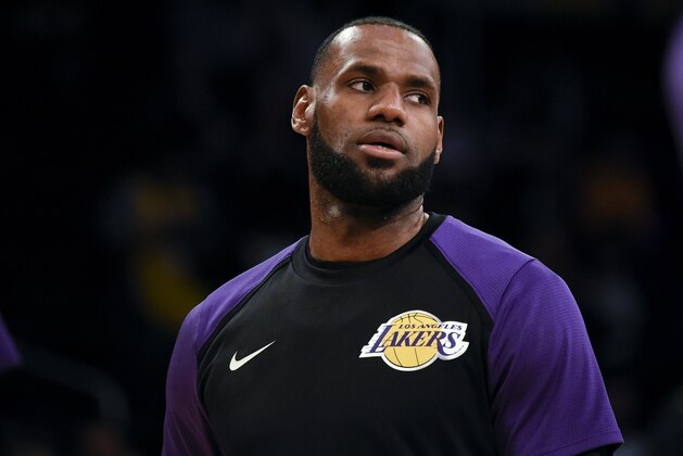 Los Angeles Lakers forward LeBron James warms up prior to an NBA preseason basketball game against the Sacramento Kings in Los Angeles, Thursday, Oct. 4, 2018. (AP Photo/Kelvin Kuo)