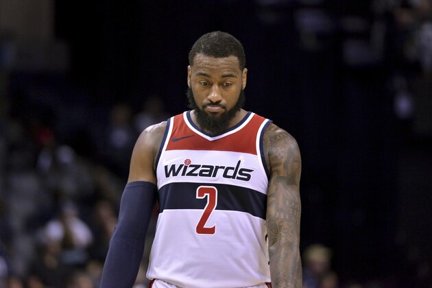 Washington Wizards guard John Wall (2) stands on the court in the second half of an NBA basketball game against the Memphis Grizzlies Tuesday, Oct. 30, 2018, in Memphis, Tenn. (AP Photo/Brandon Dill)