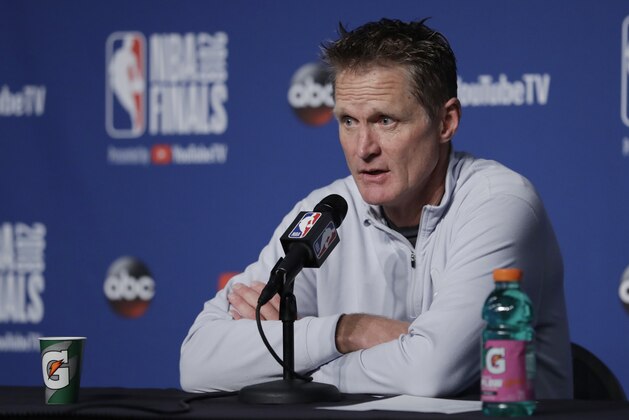 Golden State Warriors coach Steve Kerr speaks to reporters after the Warriors defeated the Cleveland Cavaliers 108-85 in Game 4 of basketball's NBA Finals to win the NBA championship, early Saturday, June 9, 2018, in Cleveland. (AP Photo/Tony Dejak)