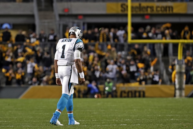Carolina Panthers quarterback Cam Newton walks onto the field during the second half of the team's NFL football game against the Pittsburgh Steelers in Pittsburgh, Thursday, Nov. 8, 2018. The Steelers won 52-21. (AP Photo/Don Wright)