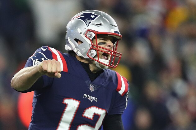 FOXBOROUGH, MA - NOVEMBER 04:  Tom Brady #12 of the New England Patriots celebrates a second quarter touchdown by Cordarrelle Patterson #84 (not pictured) against the Green Bay Packers at Gillette Stadium on November 4, 2018 in Foxborough, Massachusetts.  (Photo by Maddie Meyer/Getty Images)