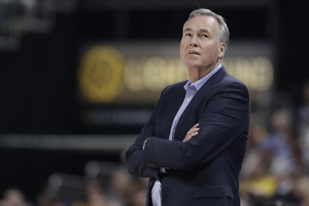 Houston Rockets head coach Mike D'Antoni looks up at the scoreboard during the first half of an NBA basketball game against the Indiana Pacers, Monday, Nov. 5, 2018, in Indianapolis. (AP Photo/Darron Cummings)