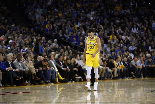 OAKLAND, CA - NOVEMBER 08:  Stephen Curry #30 of the Golden State Warriors walks back downcourt during their loss to the Milwaukee Bucks at ORACLE Arena on November 8, 2018 in Oakland, California.  NOTE TO USER: User expressly acknowledges and agrees that, by downloading and or using this photograph, User is consenting to the terms and conditions of the Getty Images License Agreement.  (Photo by Ezra Shaw/Getty Images)