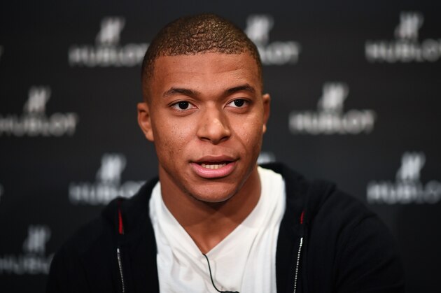 France's forward Kylian MBappe poses during a photo session after an interview with AFP in which he announced the formalization of his Ambassadorship with the Swiss luxury watchmaker Hublot on November 8, 2018. - Mbappe, who will turn 20 on December 20, became in the summer of 2017 the second most expensive player in football history with a move costing 180 million euros, behind his Brazilian teammate Neymar who's move cost 222 million euros (264 million US dollars). (Photo by FRANCK FIFE / AFP)        (Photo credit should read FRANCK FIFE/AFP/Getty Images)