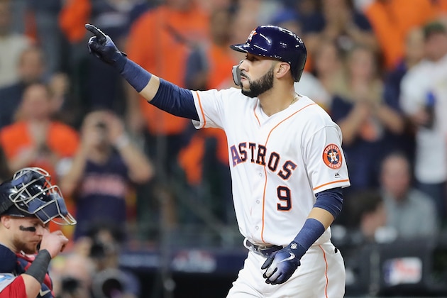 HOUSTON, TX - OCTOBER 18:  Marwin Gonzalez #9 of the Houston Astros celebrates after hitting a solo home run in the seventh inning against the Boston Red Sox during Game Five of the American League Championship Series at Minute Maid Park on October 18, 2018 in Houston, Texas.  (Photo by Elsa/Getty Images)