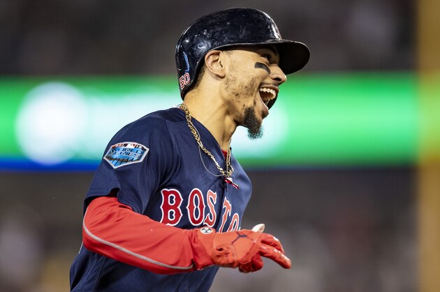 LOS ANGELES, CA - OCTOBER 28: Mookie Betts #50 of the Boston Red Sox reacts as he rounds the bases after hitting a solo home run during the sixth inning of game five of the 2018 World Series against the Los Angeles Dodgers on October 28, 2018 at Dodger Stadium in Los Angeles, California. (Photo by Billie Weiss/Boston Red Sox/Getty Images)