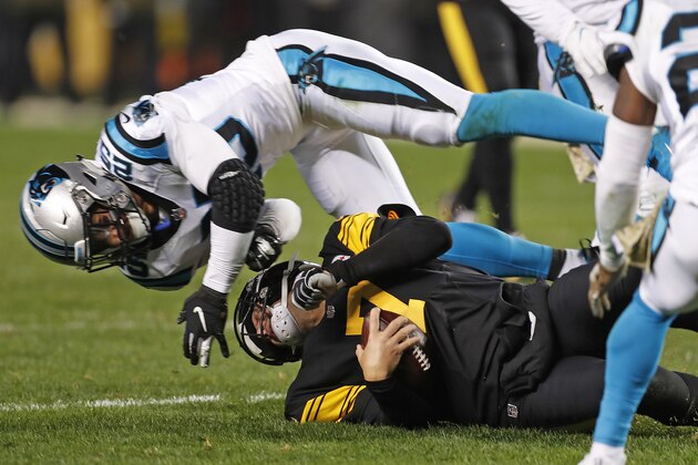 Pittsburgh Steelers quarterback Ben Roethlisberger (7) is hit by Carolina Panthers strong safety Eric Reid (25) as he slides at the end of a run during the second half of an NFL football game in Pittsburgh, Thursday, Nov. 8, 2018. Reid was ejected. (AP Photo/Keith Srakocic)