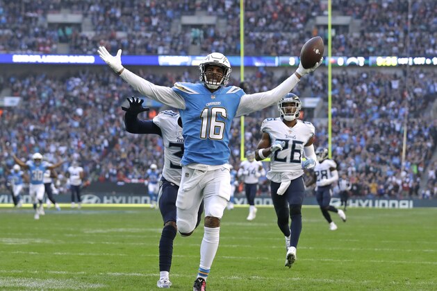 Los Angeles Chargers wide receiver Tyrell Williams (16) celebrates as he scores a touchdown during the first half of an NFL football game against Tennessee Titans at Wembley stadium in London, Sunday, Oct. 21, 2018. (AP Photo/Matt Dunham)
