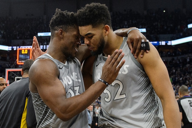 MINNEAPOLIS, MN - APRIL 11: Jimmy Butler #23 and Karl-Anthony Towns #32 of the Minnesota Timberwolves celebrate defeating the Denver Nuggets after the game on April 11, 2018 at the Target Center in Minneapolis, Minnesota. The Timberwolves defeated the Nuggets 112-106. NOTE TO USER: User expressly acknowledges and agrees that, by downloading and or using this Photograph, user is consenting to the terms and conditions of the Getty Images License Agreement. (Photo by Hannah Foslien/Getty Images)