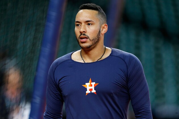 HOUSTON, TX - OCTOBER 16:  Carlos Correa #1 of the Houston Astros looks on during batting practice before Game Three of the American League Championship Series against the Boston Red Sox at Minute Maid Park on October 16, 2018 in Houston, Texas.  (Photo by Bob Levey/Getty Images)
