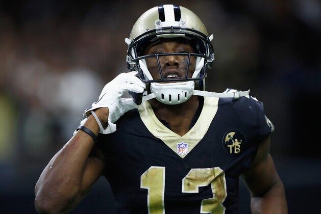 NEW ORLEANS, LA - NOVEMBER 04:  Michael Thomas #13 of the New Orleans Saints pretends to make a call on a cell phone in celebration of scoring a touchdown in the fourth quarter of the game against the Los Angeles Rams at Mercedes-Benz Superdome on November 4, 2018 in New Orleans, Louisiana.  (Photo by Wesley Hitt/Getty Images)