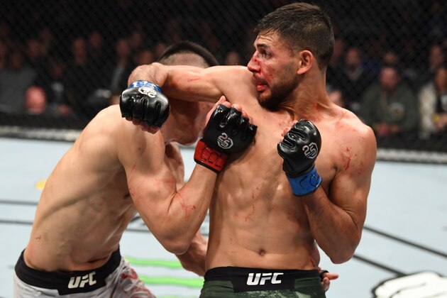 DENVER, CO - NOVEMBER 10:  (R-L) Yair Rodriguez of Mexico lands an elbow against Chan Sung Jung of South Korea in their featherweight bout during the UFC Fight Night event inside Pepsi Center on November 10, 2018 in Denver, Colorado. (Photo by Josh Hedges/Zuffa LLC/Zuffa LLC via Getty Images)