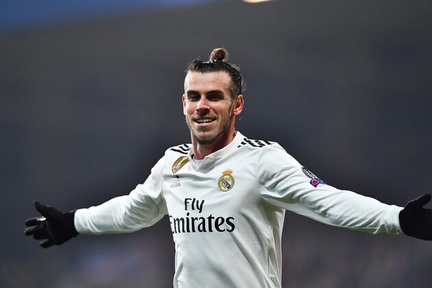 Real Madrid's Welsh forward Gareth Bale celebrates after scoring during the UEFA Champions League group G football match Viktoria Plzen v Real Madrid in Plzen, Czech Republic on November 7, 2018. (Photo by JOE KLAMAR / AFP)        (Photo credit should read JOE KLAMAR/AFP/Getty Images)