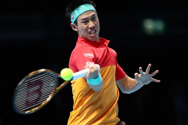 LONDON, ENGLAND - NOVEMBER 11:  Kei Nishikori of Japan plays a forehand during his match against Roger Federer of Switzerland during Day One of the Nitto ATP World Tour Finals at The O2 Arena on November 11, 2018 in London, England.  (Photo by Clive Brunskill/Getty Images)