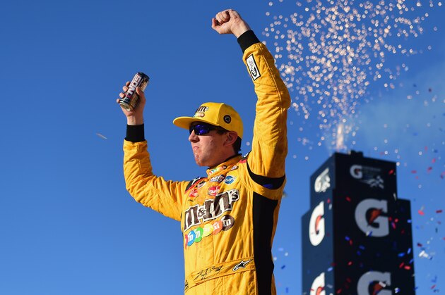 PHOENIX, AZ - NOVEMBER 11:  Kyle Busch, driver of the #18 M&M's Toyota, celebrates in Victory Lane after winning the Monster Energy NASCAR Cup Series Can-Am 500 at ISM Raceway on November 11, 2018 in Phoenix, Arizona.  (Photo by Jared C. Tilton/Getty Images)