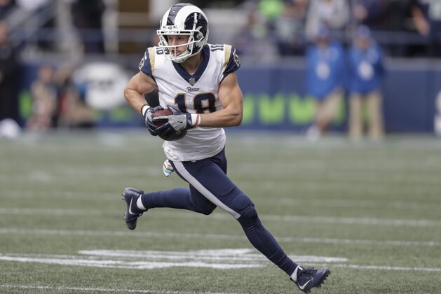 SEATTLE, WA - OCTOBER 07: Wide receiver Cooper Kupp #18 of the Los Angeles Rams runs with the ball after making a reception during  game against the Seattle Seahawks at CenturyLink Field on October 7, 2018 in Seattle, Washington. The Rams won the game 33-31. (Photo by Stephen Brashear/Getty Images)