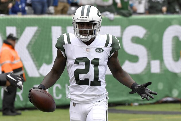 New York Jets cornerback Morris Claiborne (21) reacts after scoring on an interception return on a pass from Indianapolis Colts quarterback Andrew Luck during the first half of an NFL football game, Sunday, Oct. 14, 2018, in East Rutherford, N.J. (AP Photo/Bill Kostroun)