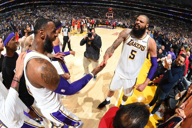 LOS ANGELES, CA - NOVEMBER 11: Tyson Chandler #5 of the Los Angeles Lakers celebrates to a Laker's win with LeBron James #23 of the Los Angeles Lakers after the game against the Atlanta Hawks on November 11, 2018 at STAPLES Center in Los Angeles, California. NOTE TO USER: User expressly acknowledges and agrees that, by downloading and/or using this Photograph, user is consenting to the terms and conditions of the Getty Images License Agreement. Mandatory Copyright Notice: Copyright 2018 NBAE (Photo by Andrew D. Bernstein/NBAE via Getty Images)