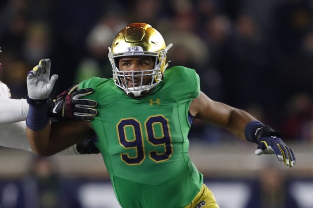 Notre Dame defensive lineman Jerry Tillery (99) rushes against Florida State in the first half of an NCAA college football game in South Bend, Ind.,Saturday, Nov. 10, 2018. (AP Photo/Paul Sancya)