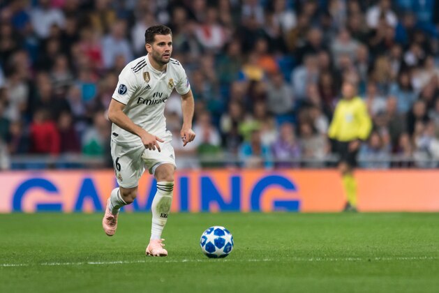 MADRID, SPAIN - OCTOBER 23: Nacho of Real Madrid controls the ball during the UEFA Champions League Group G match between Real Madrid and Viktoria Plzen at Bernabeu on October 23, 2018 in Madrid, Spain. (Photo by TF-Images/Getty Images)