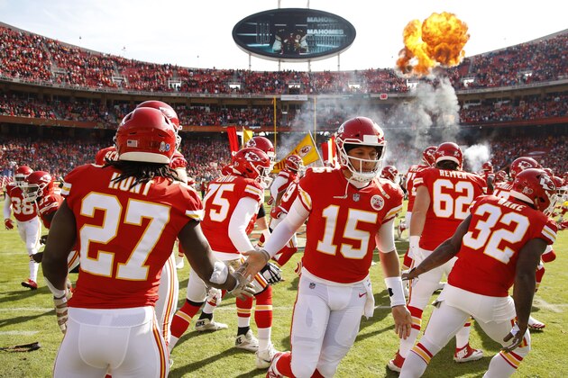 Kansas City Chiefs quarterback Patrick Mahomes (15) runs onto the field before an NFL football game against the Arizona Cardinals Sunday, Nov. 11, 2018, in Kansas City, Mo. The Chiefs won 26-14. (AP Photo/Charlie Riedel)