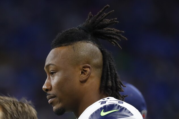 Seattle Seahawks wide receiver Brandon Marshall (15) watches from the bench against the Detroit Lions during an NFL football game in Detroit, Sunday, Oct. 28, 2018. (AP Photo/Paul Sancya)