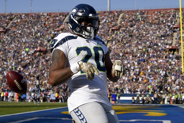 Seattle Seahawks running back Rashaad Penny celebrates after scoring during the first half in an NFL football game against the Los Angeles Rams Sunday, Nov. 11, 2018, in Los Angeles. (AP Photo/Mark J. Terrill)
