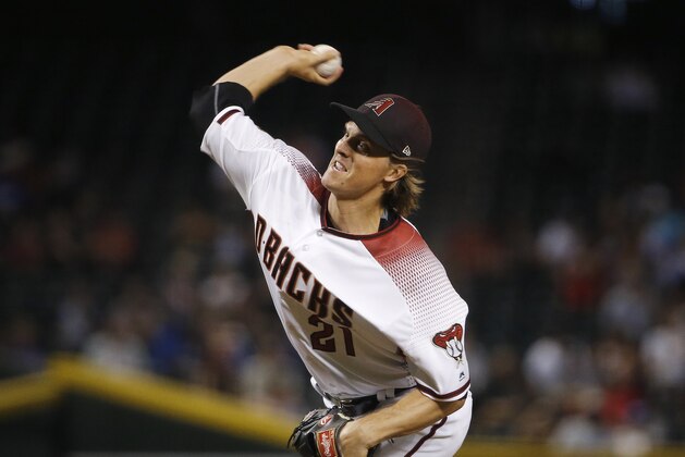 Arizona Diamondbacks starting pitcher Zack Greinke throws to a Los Angeles Dodgers batter during the first inning of a baseball game Wednesday, Sept. 26, 2018, in Phoenix. (AP Photo/Ross D. Franklin)