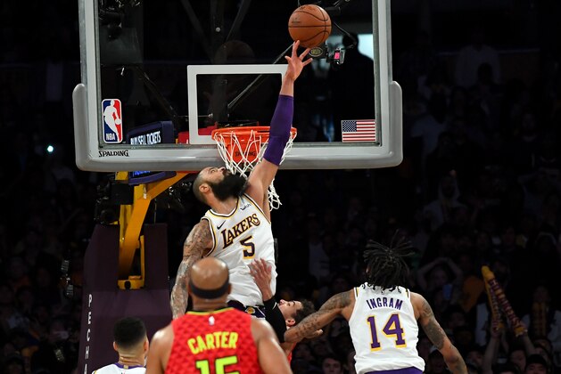 LOS ANGELES, CALIFORNIA - NOVEMBER 11: Tyson Chandler #5 of the Los Angeles Lakers blocks a shot at the buzzer by Trae Young #11 of the Atlanta Hawks to win the the game at Staples Center on November 11, 2018 in Los Angeles, California. NOTE TO USER: User expressly acknowledges and agrees that, by downloading and or using this photograph, User is consenting to the terms and conditions of the Getty Images License Agreement. (Photo by Jayne Kamin-Oncea/Getty Images)