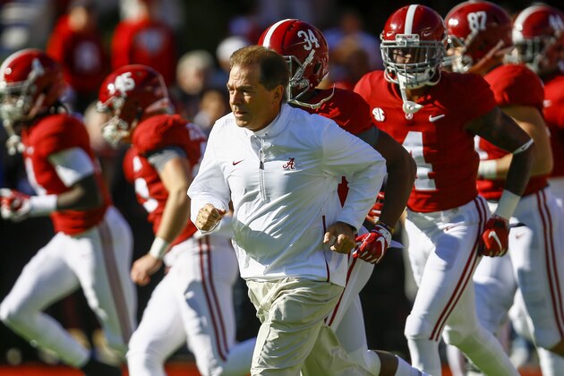 Alabama head coach Nick Saban leads the team onto the field before the start of an NCAA college football game, Saturday, Nov. 10, 2018, in Tuscaloosa, Ala. (AP Photo/Butch Dill)