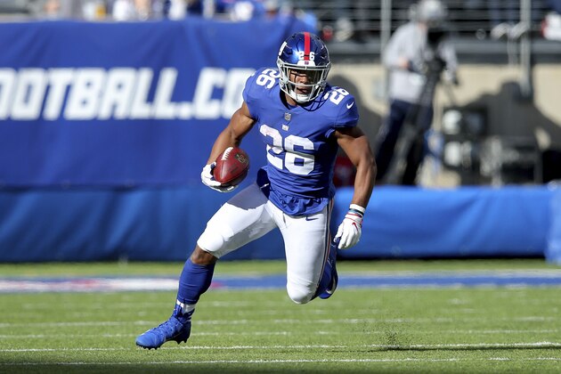 New York Giants running back Saquon Barkley (26) in action against the Washington Redskins during an NFL football game on Sunday, Oct. 28, 2018, in East Rutherford, N.J. (Brad Penner/AP Images for Panini)