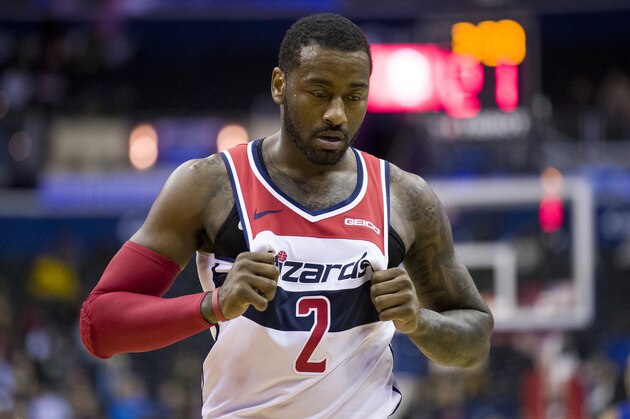 Washington Wizards guard John Wall (2) stands on the court during a break in the first half of an NBA basketball game against the Orlando Magic, Monday, Nov. 12, 2018, in Washington. (AP Photo/Alex Brandon)
