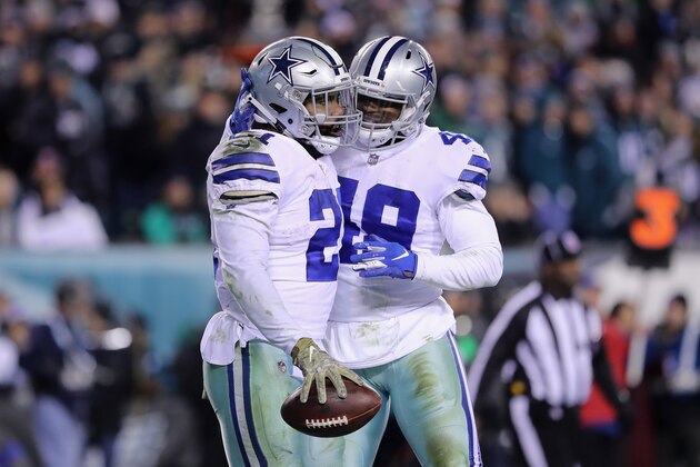 PHILADELPHIA, PA - NOVEMBER 11:  Running back Ezekiel Elliott #21 of the Dallas Cowboys celebrates his touchdown with teammate running back Jamize Olawale #49 against the Philadelphia Eagles during the fourth quarter at Lincoln Financial Field on November 11, 2018 in Philadelphia, Pennsylvania.  (Photo by Elsa/Getty Images)