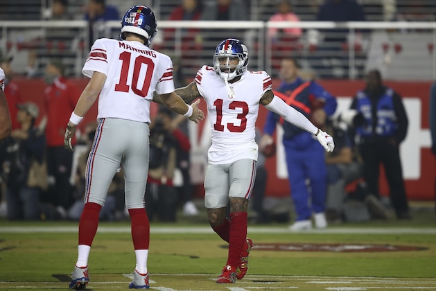 New York Giants wide receiver Odell Beckham Jr. (13) and quarterback Eli Manning (10) celebrate after connecting on a touchdown pass against the San Francisco 49ers during the second half of an NFL football game in Santa Clara, Calif., Monday, Nov. 12, 2018. (AP Photo/Ben Margot)