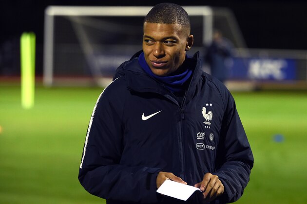 CLAIREFONTAINE, FRANCE - NOVEMBER 12:  France player Kylian Mbappe arrives to a training session at the French National Football Team Center in Clairefontaine-en-Yvelines on November 12, 2018 in Clairefontaine, France. The French national football team begin their preparation for the upcoming UEFA Nations League match against The Netherlands next Friday.  (Photo by Frederic Stevens/Getty Images)