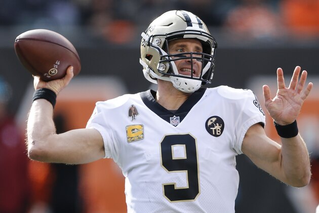 New Orleans Saints quarterback Drew Brees passes in the first half of an NFL football game against the Cincinnati Bengals, Sunday, Nov. 11, 2018, in Cincinnati. (AP Photo/Gary Landers)
