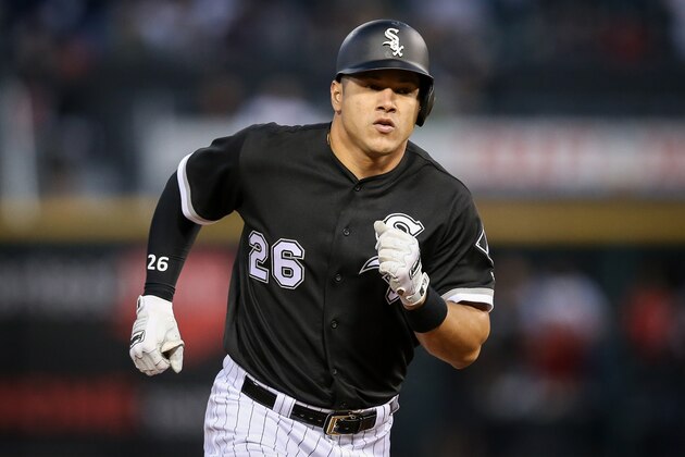 CHICAGO, IL - AUGUST 30:  Avisail Garcia #26 of the Chicago White Sox rounds the bases after hitting a home run in the first inning against the Boston Red Sox at Guaranteed Rate Field on August 30, 2018 in Chicago, Illinois.  (Photo by Dylan Buell/Getty Images)