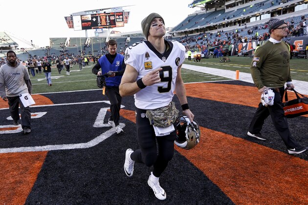 New Orleans Saints quarterback Drew Brees (9) reacts as he runs off the field following an NFL football game against the Cincinnati Bengals, Sunday, Nov. 11, 2018, in Cincinnati. (AP Photo/Frank Victores)