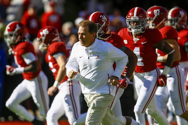 Alabama head coach Nick Saban leads the team onto the field before the start of an NCAA college football game, Saturday, Nov. 10, 2018, in Tuscaloosa, Ala. (AP Photo/Butch Dill)